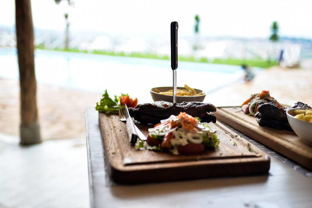 Pili Pili Boutique Hotel キガリ エクステリア 写真